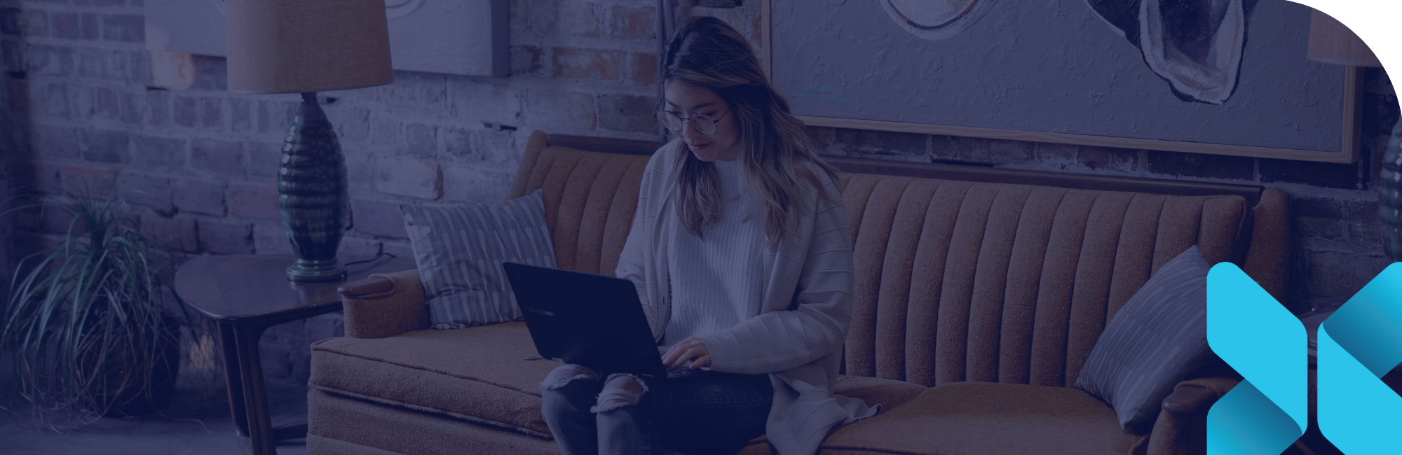 woman looking at his computer